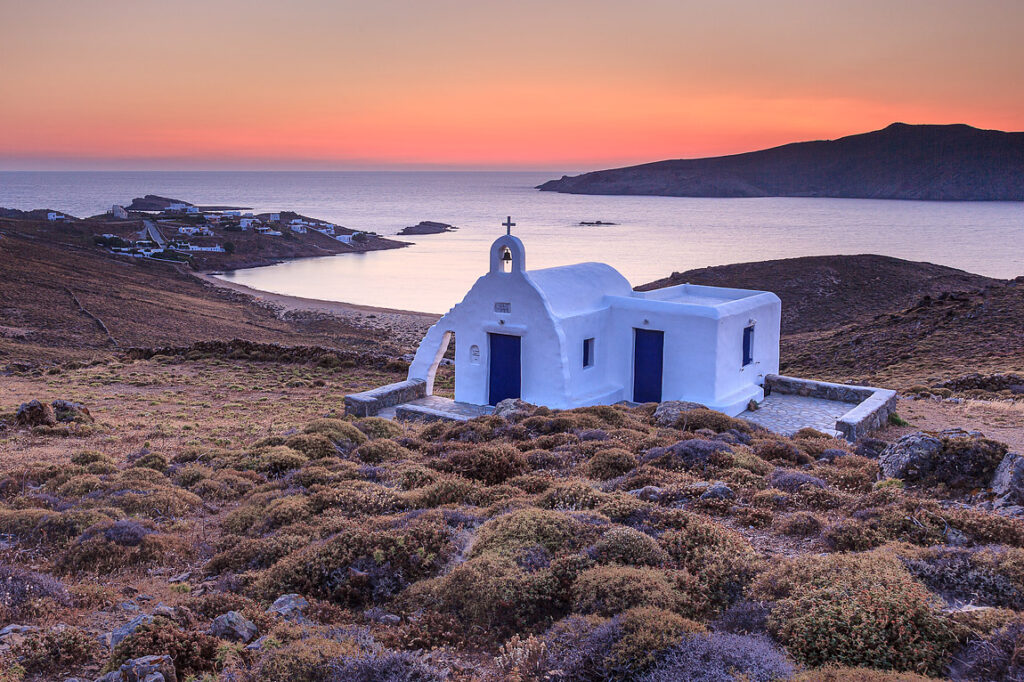 Panormos bay chapel sunrise, mykonos island, greece