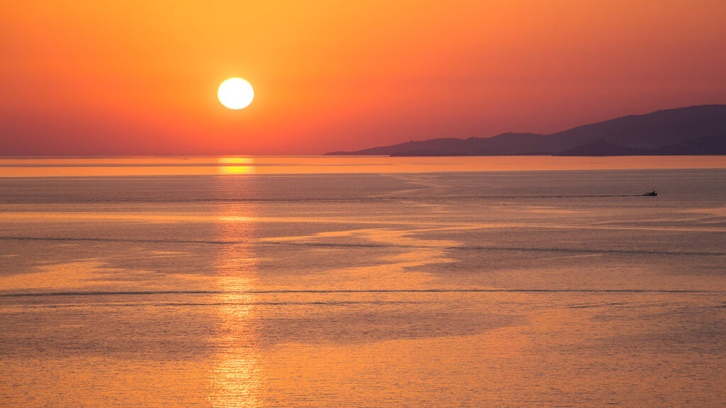 Sunset reflections, mykonos island, greece