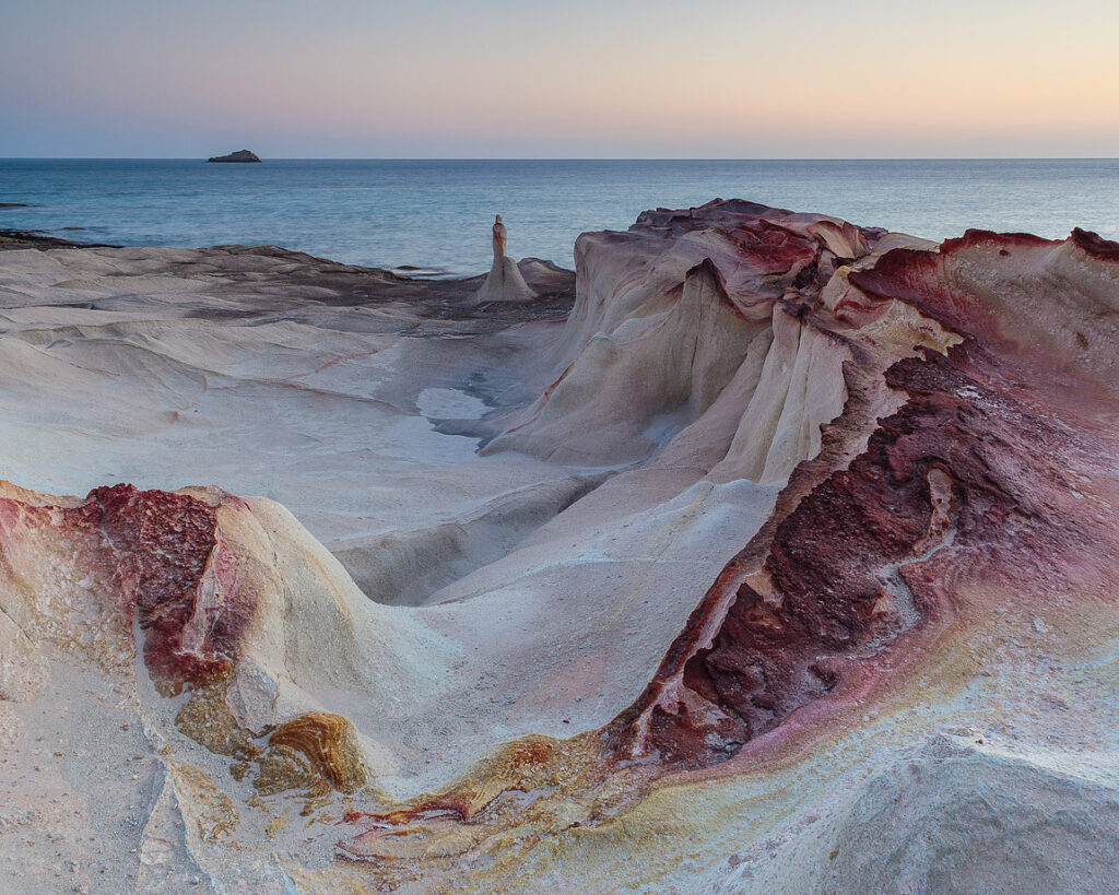 The wave at sunrise, milos island, greece